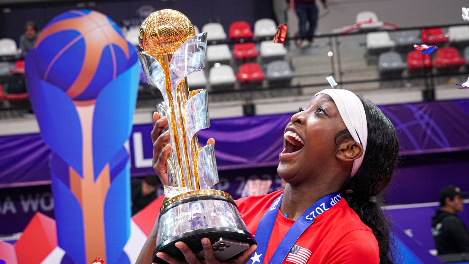 Flau'jae Johnson celebrates the championship with Team USA