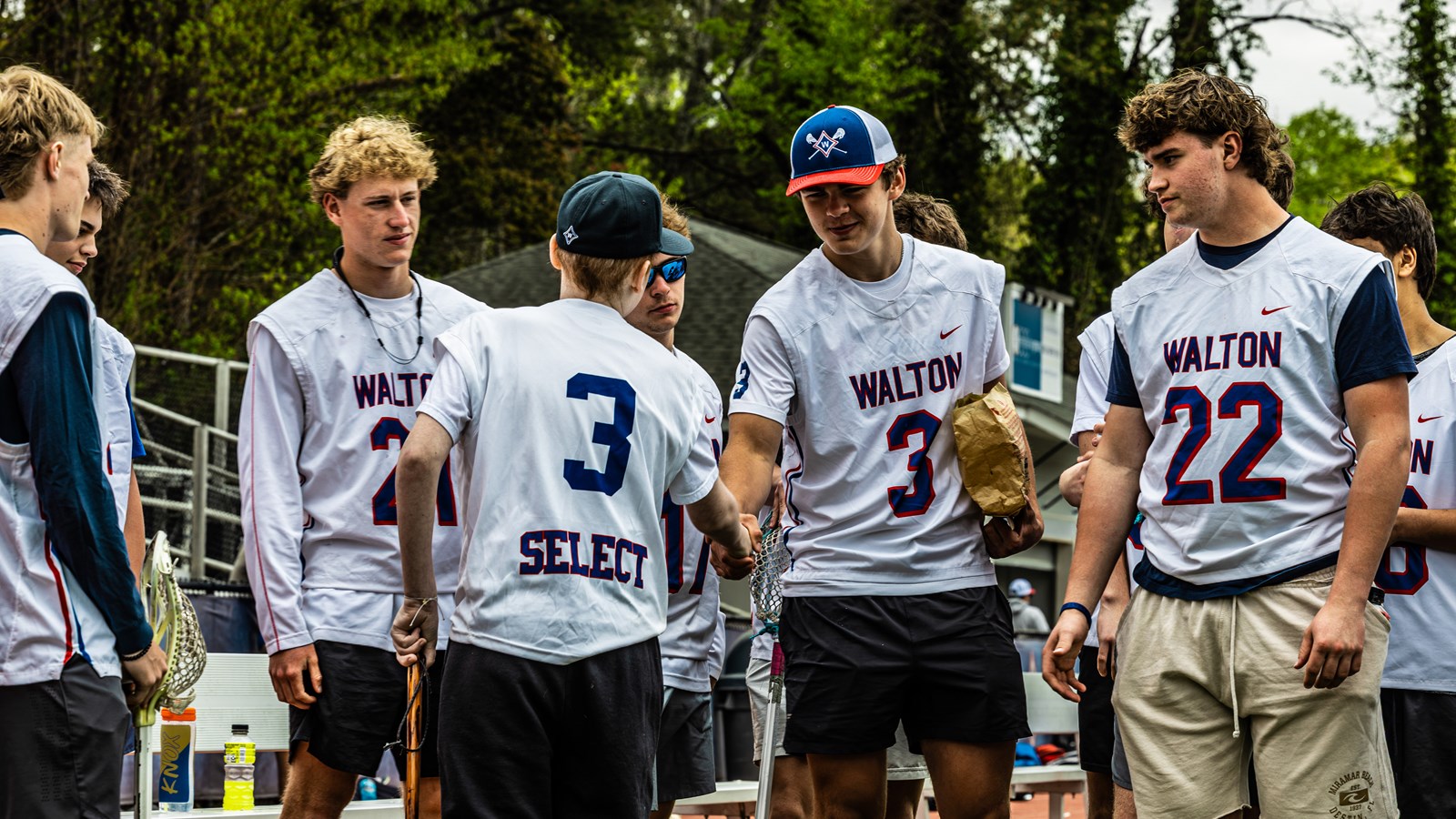 Walton varsity lacrosse players are there to support Jackson