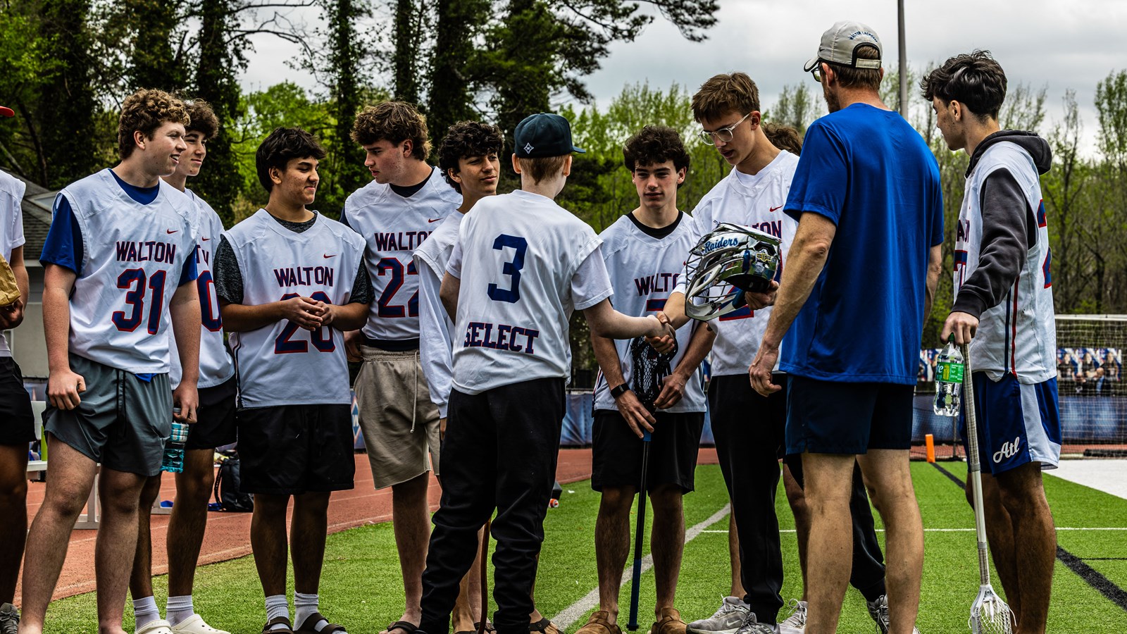 Coach Spotz watches as his players interact with Jackson