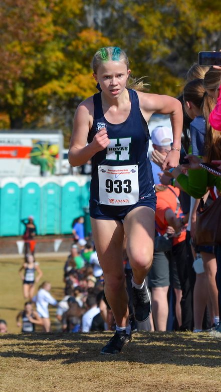 Harrison's Paige Comstock during her 2025 state title run in cross country
