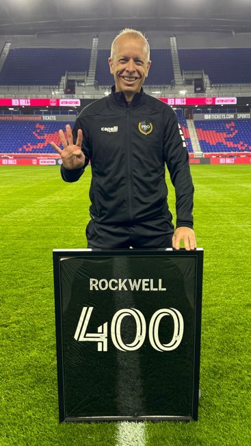 Corey Rockwell celebrates the moment he refereed his 400th MLS game