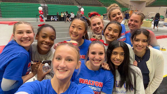 Walton's Gymnastics team celebrates their 3rd place state finish