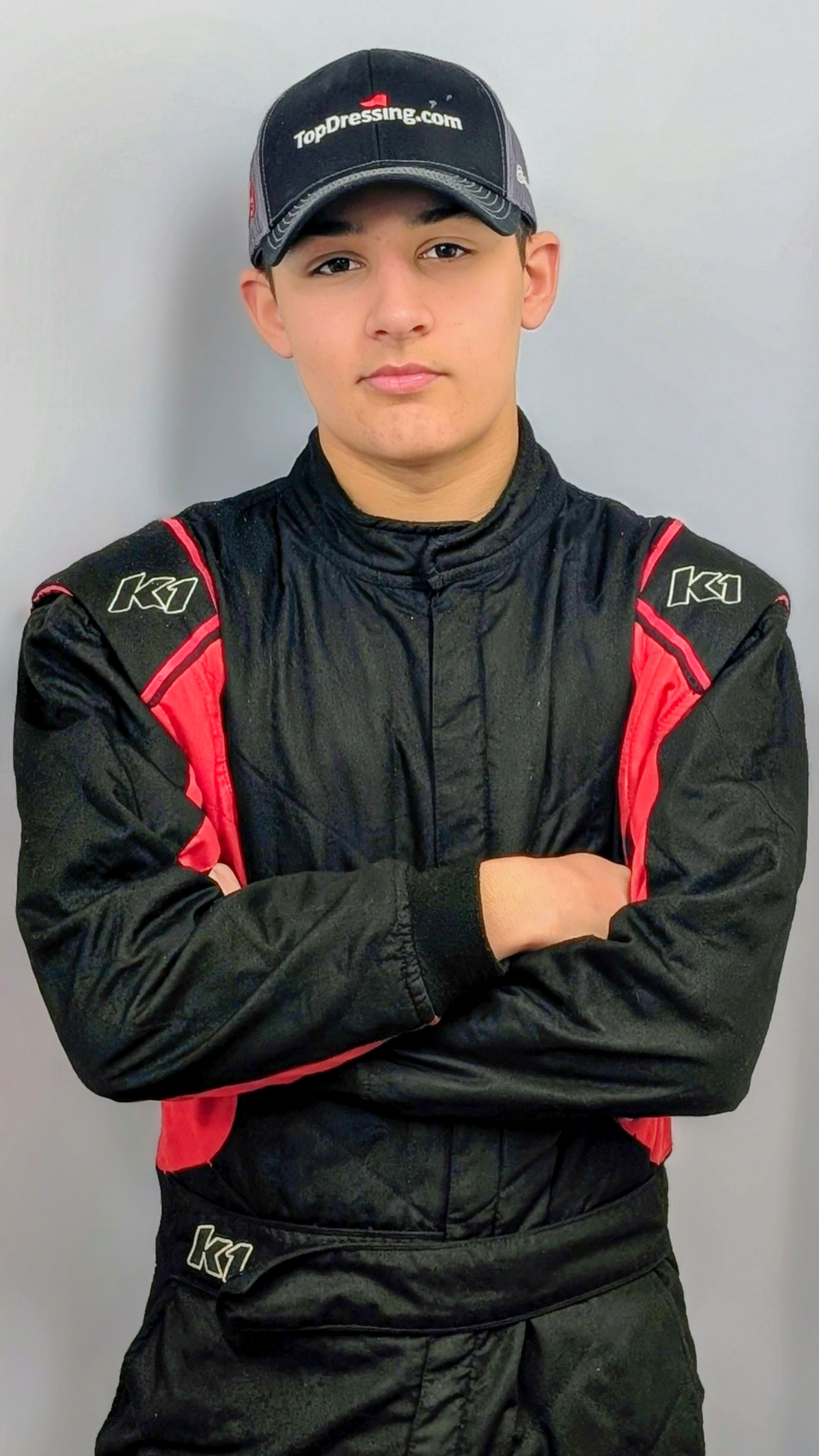 Walton's Javier Soto poses in his racing suit