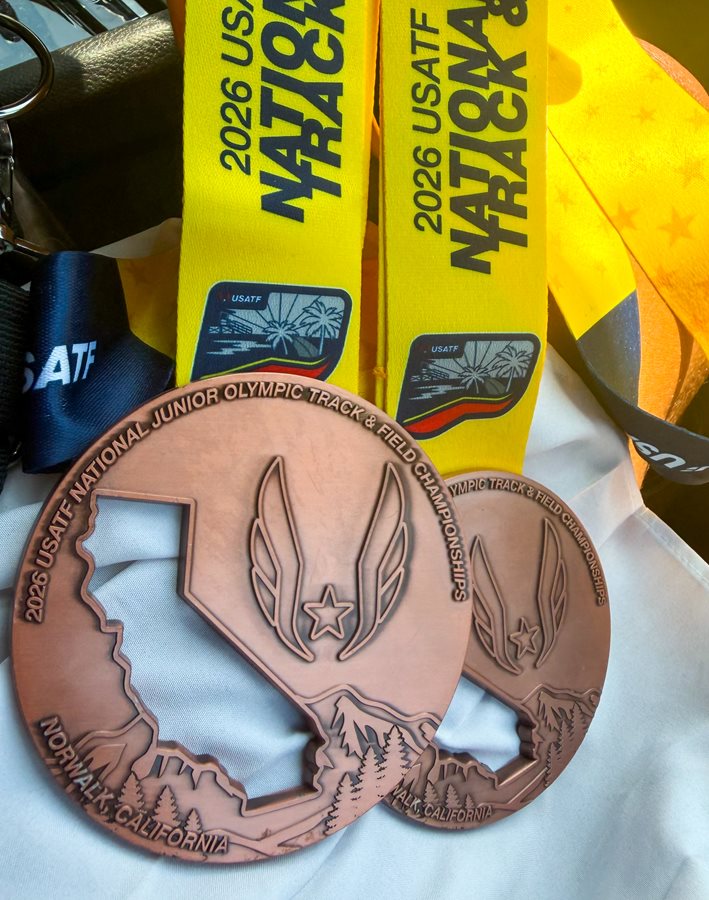 Closeup of Jonae' Holder's two medals won at the National Championships