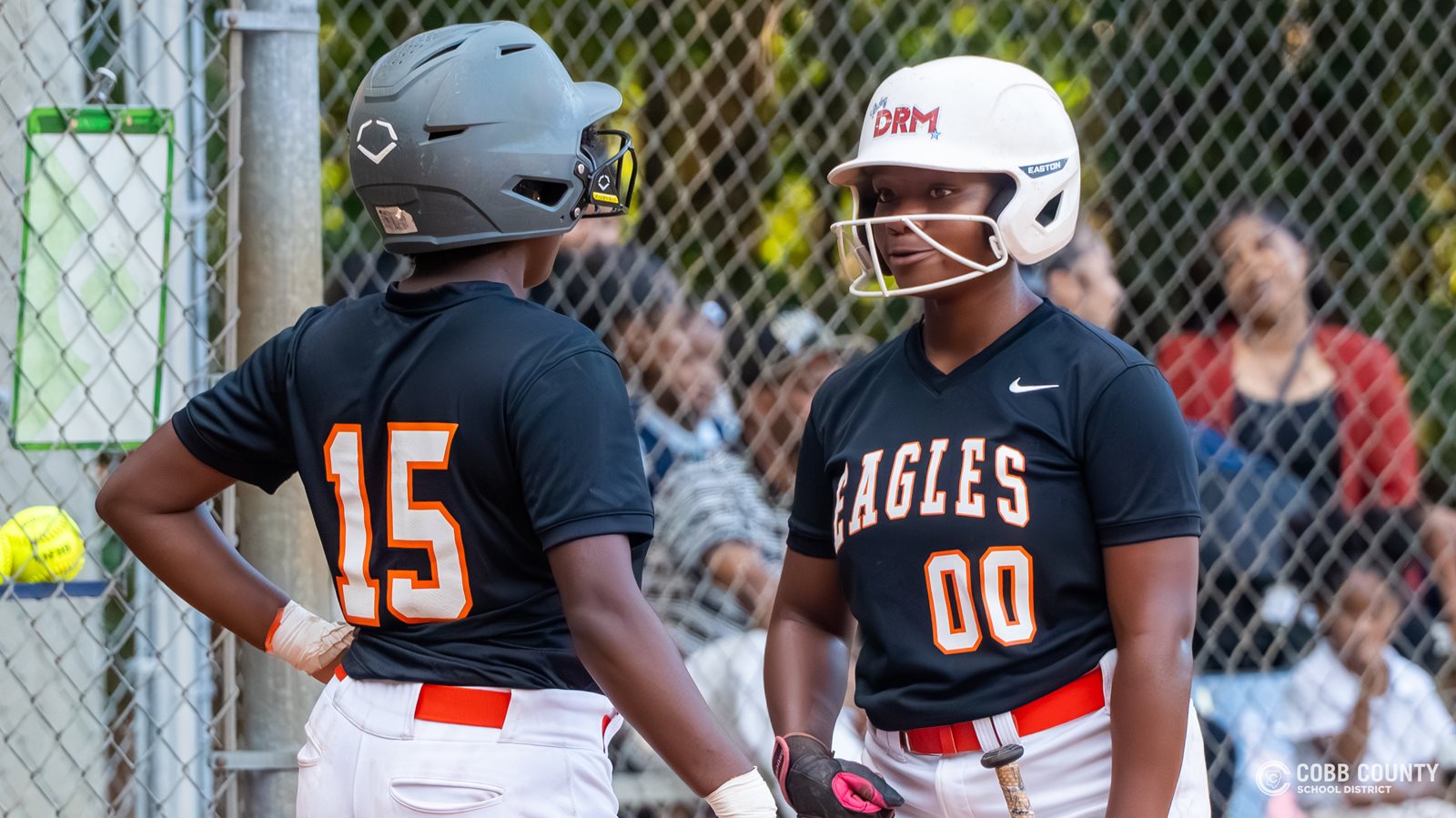 South Cobb's Janiya Fields talks with a teammate about the game