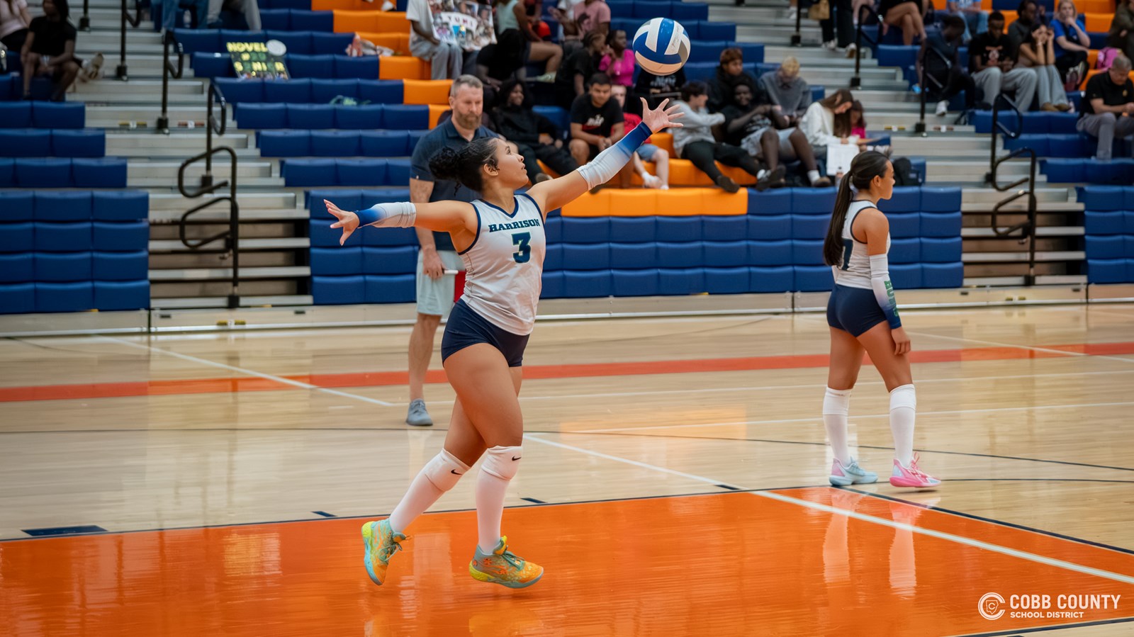 Harrison's Lilah Anderson prepares to serve