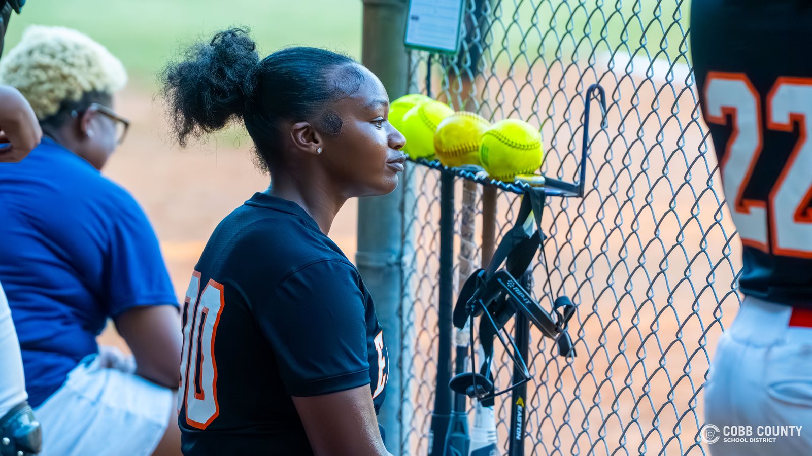South Cobb's Janiya Fields sits in the dugout between drills