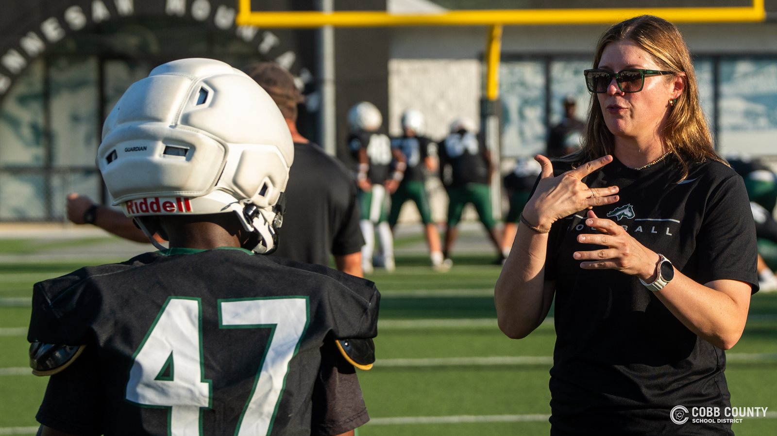 Coach Jarvis interprets for Larenzo Parker