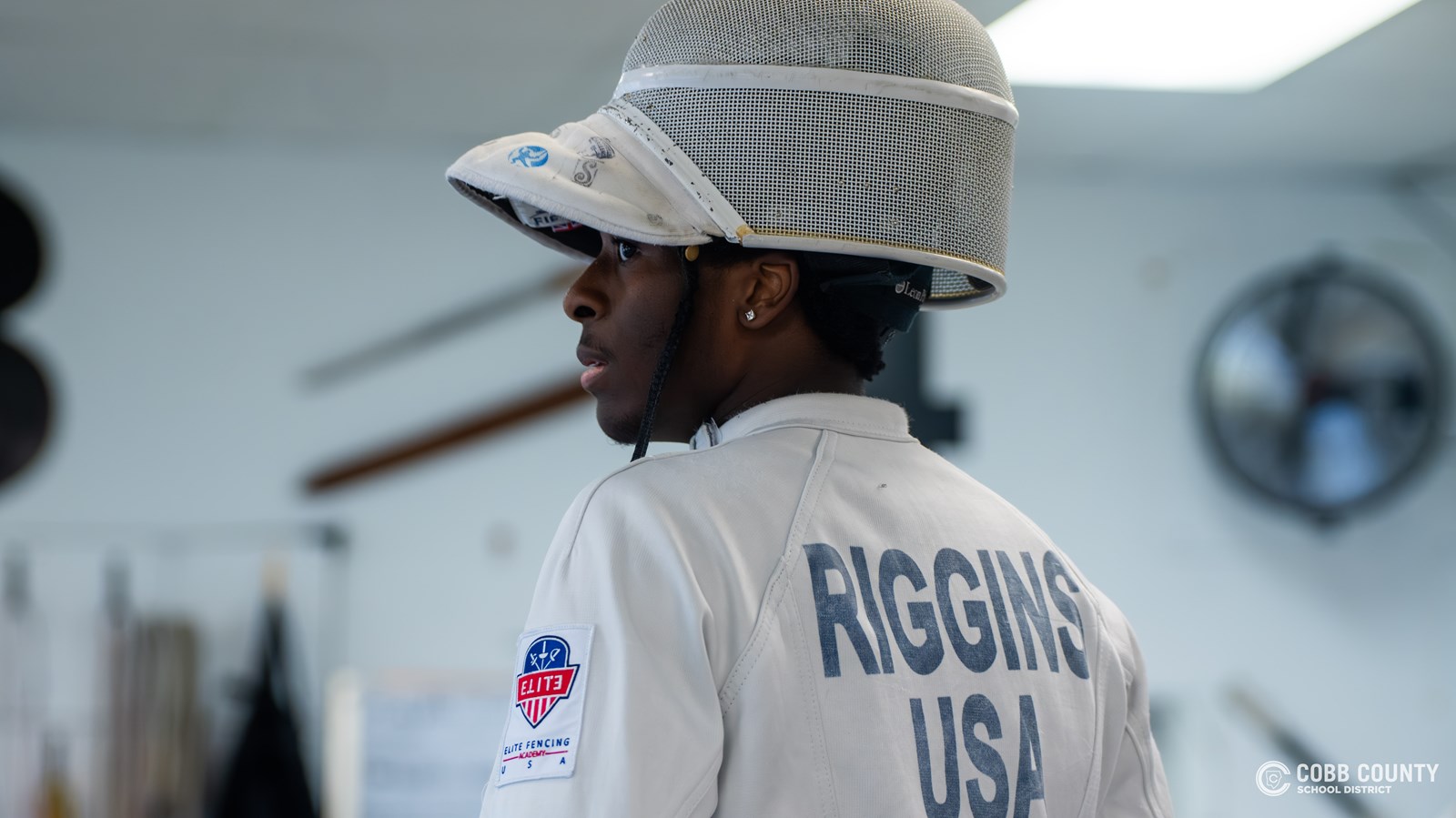 Joshua Riggins during a break in fencing practice