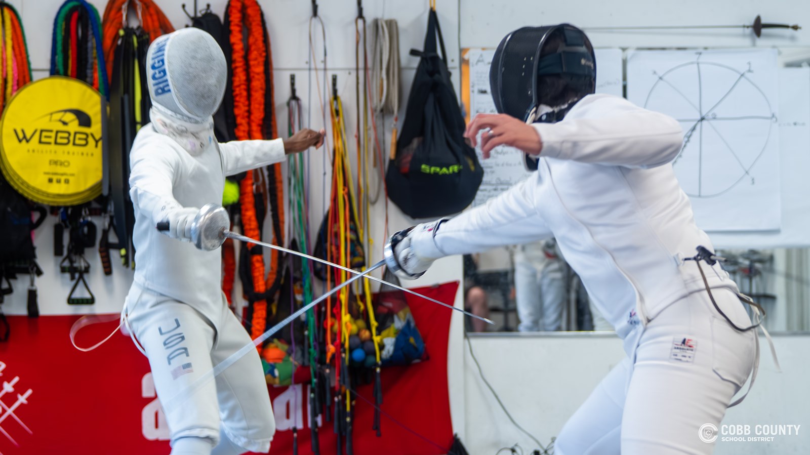 Joshua Riggins deflects his opponent's attack