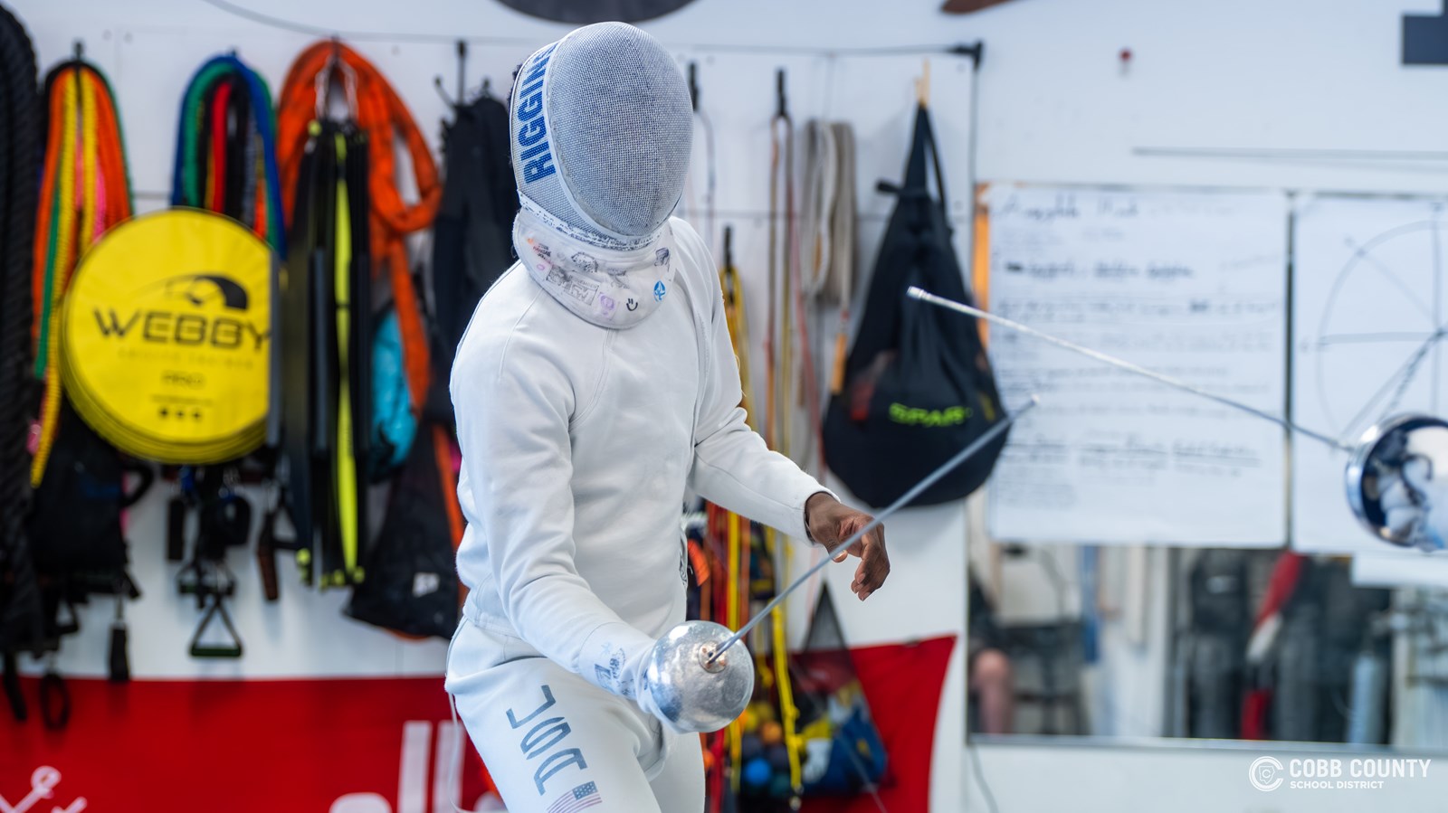 Joshua Riggins repels an attack