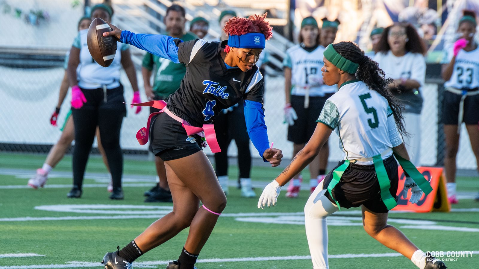 McEachern's Ava Couzens gets around the flag pull