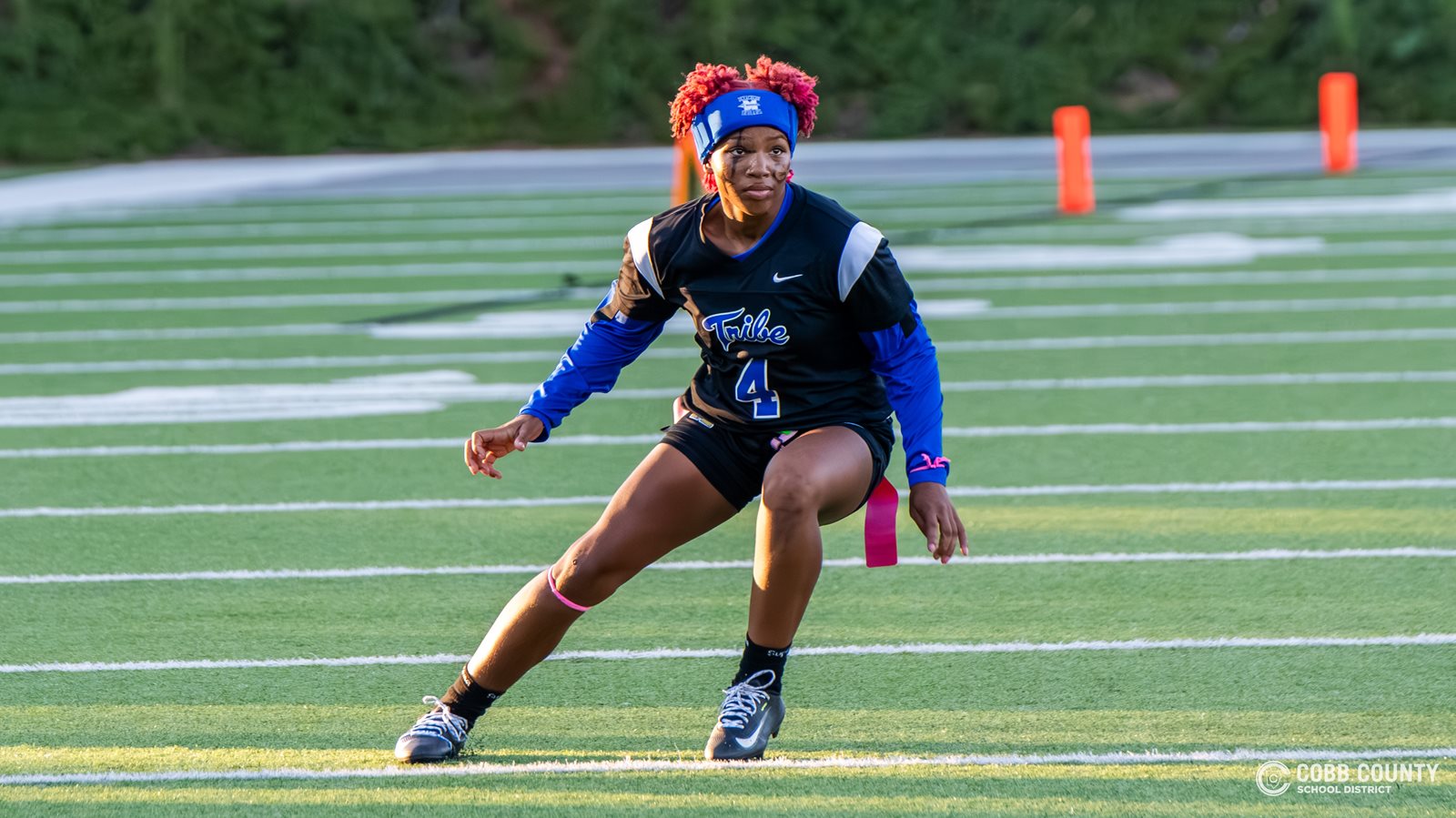 McEachern's Ava Couzens eyes the quarterback from her safety position