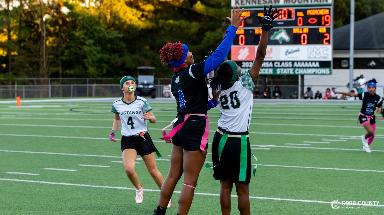McEachern's Ava Couzens rises above the receiver for a Pass BreakUp
