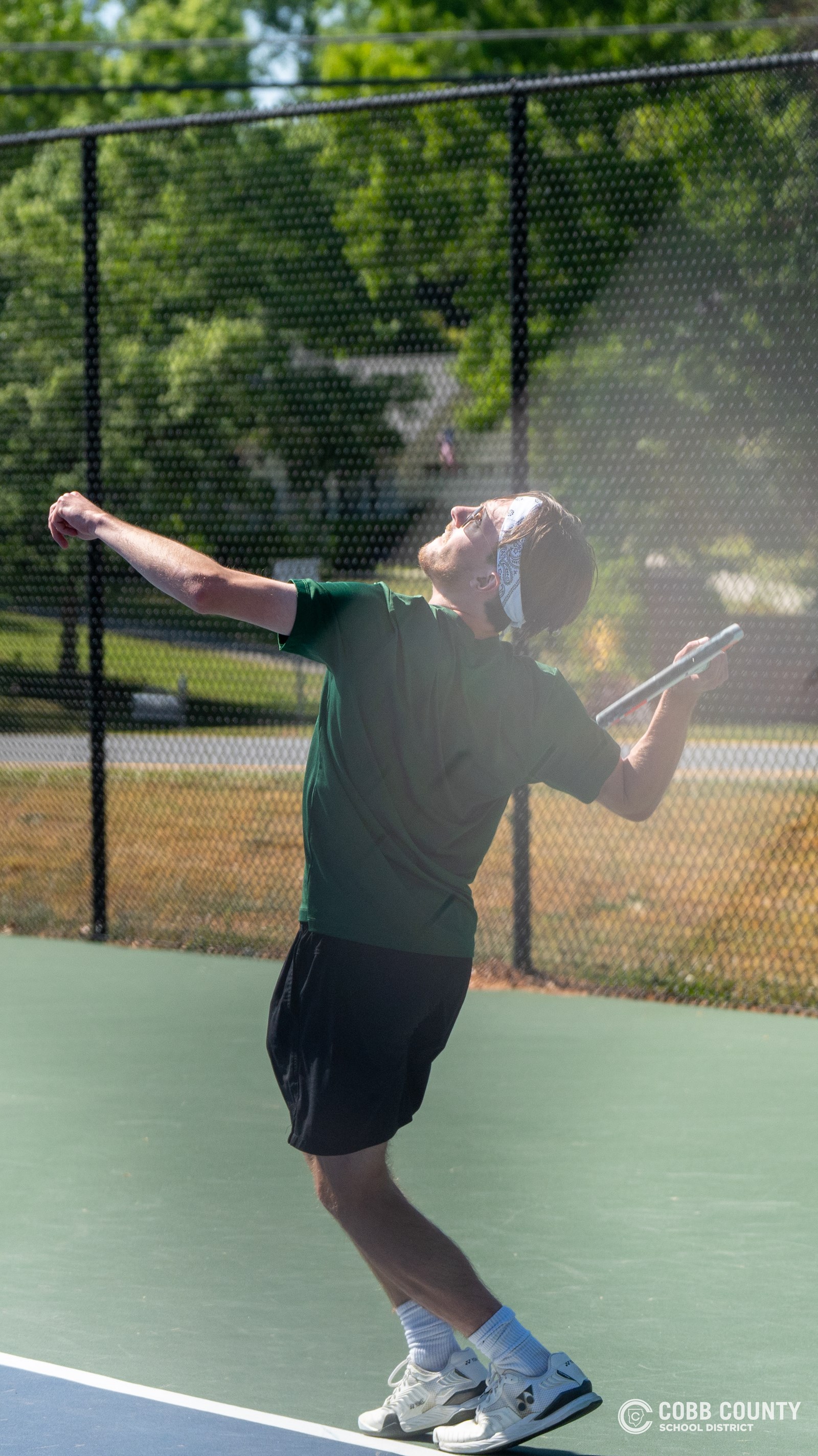 Nolen Jarl loads his racket