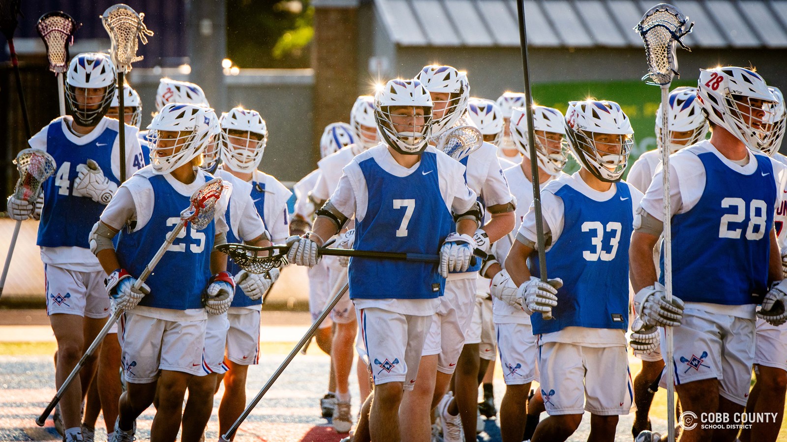 The Walton boys lacrosse team takes the field