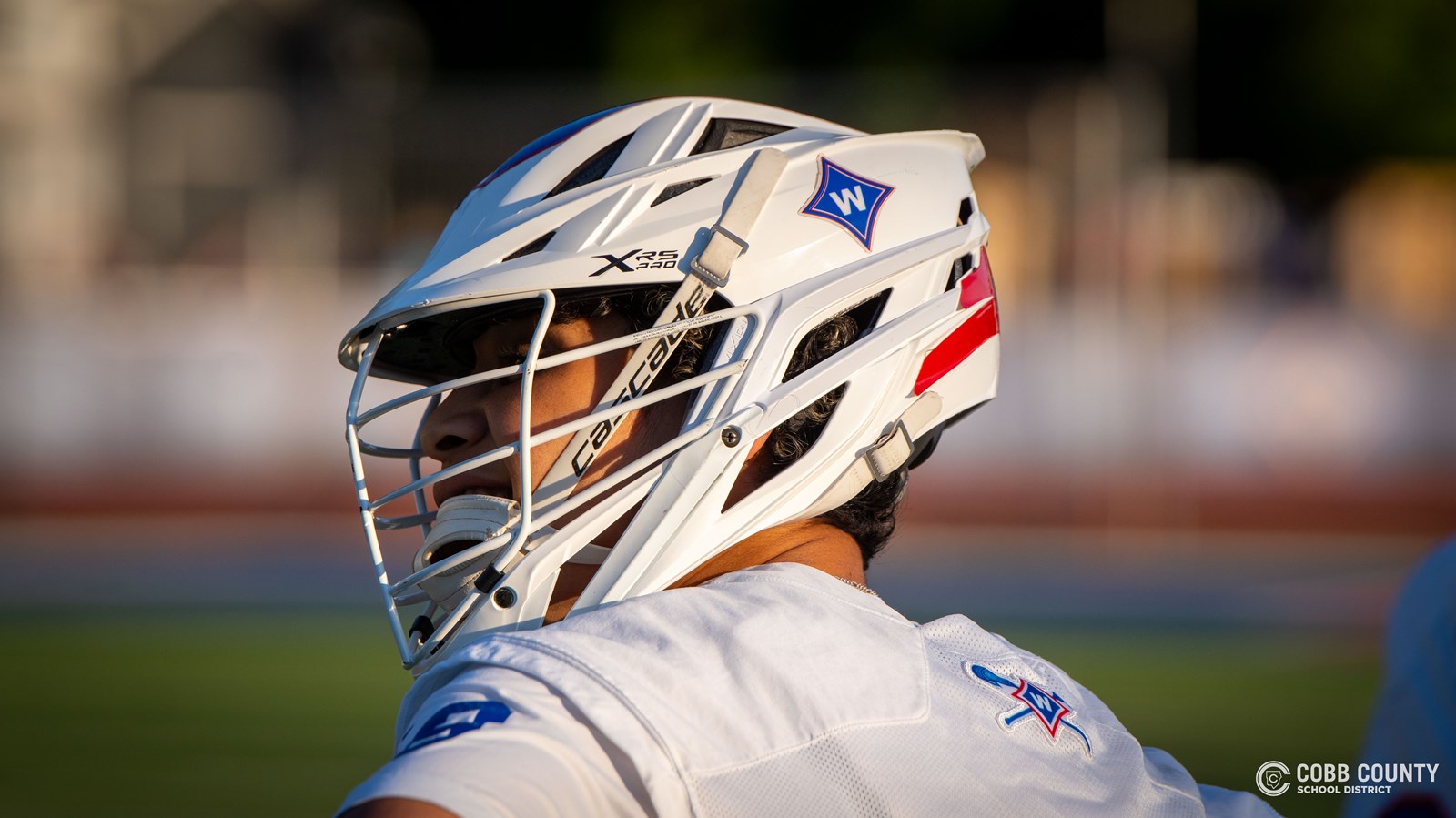 Closeup of Walton lacrosse player