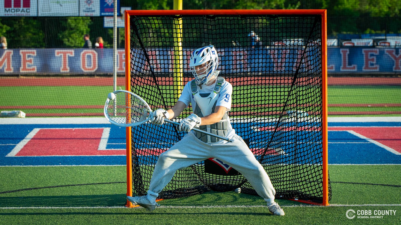 Walton senior Spencer Goldstein practices in net