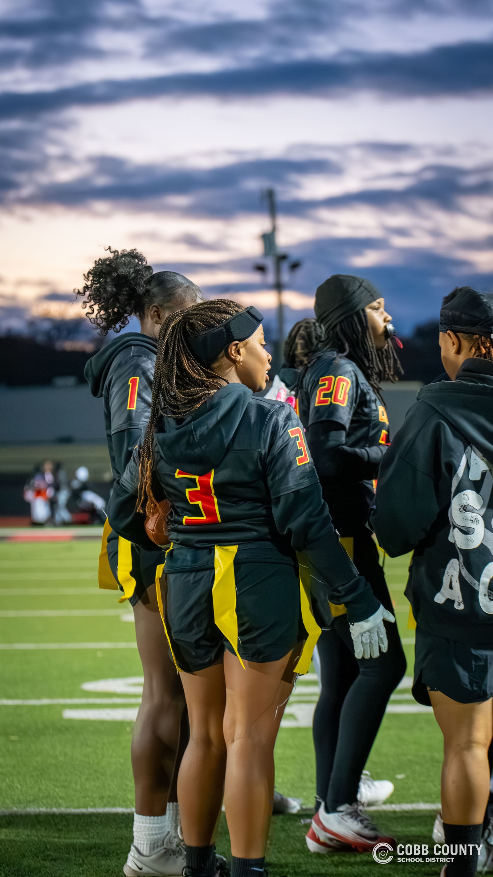 Khamiyah in the team huddle