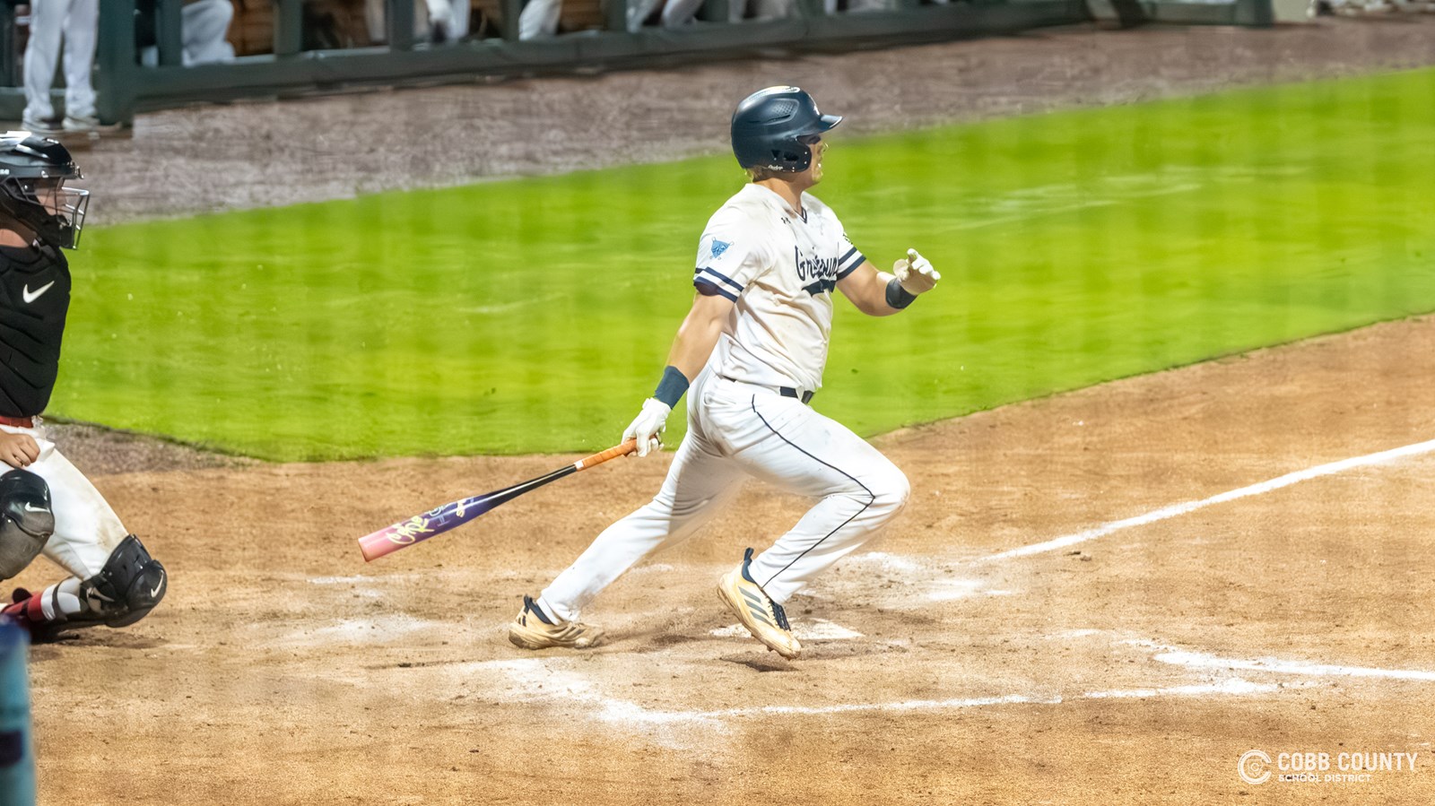 Pope senior catcher Drew Abney puts the ball in play
