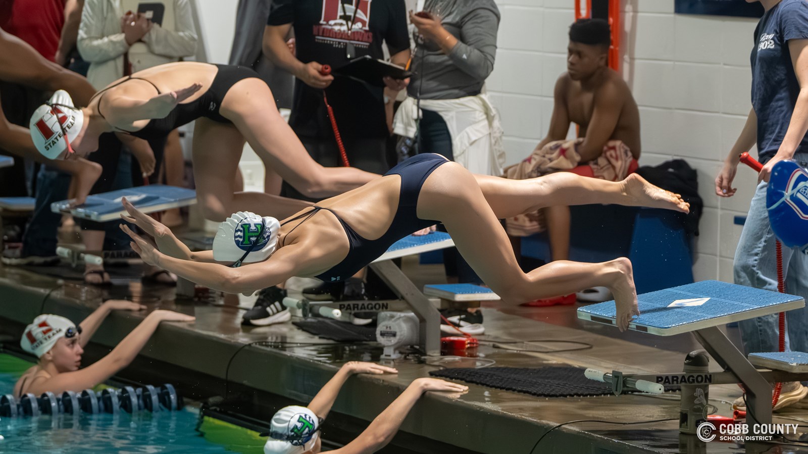 Isabella Parrenas diving into the pool