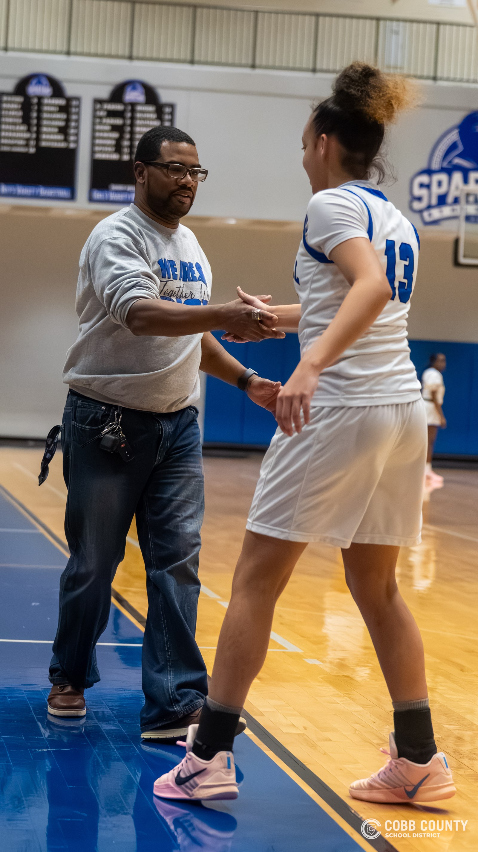 Terrell Johnson encourages a player