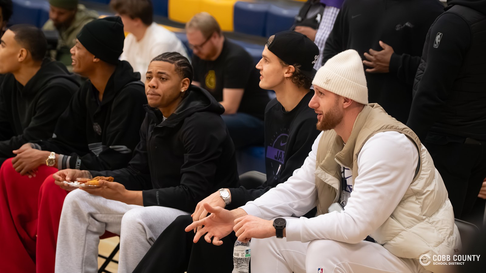 Collier's Utah Jazz teammates watch from the sidelines