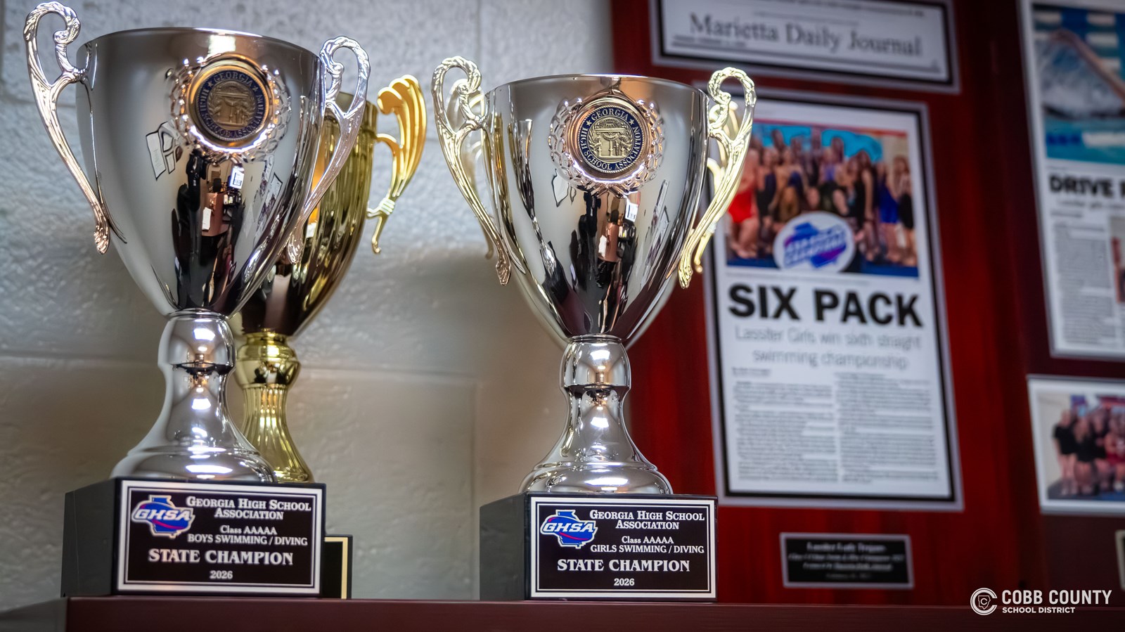 More trophies and frame articles in Coach Hughes' office