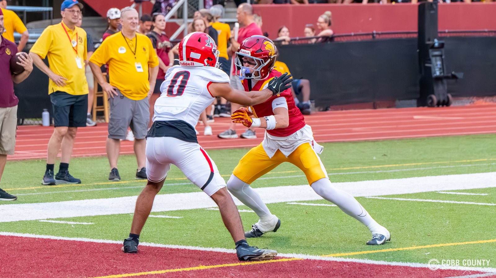Allatoona's Landon Ortega jams the receiver at the line of scrimmage