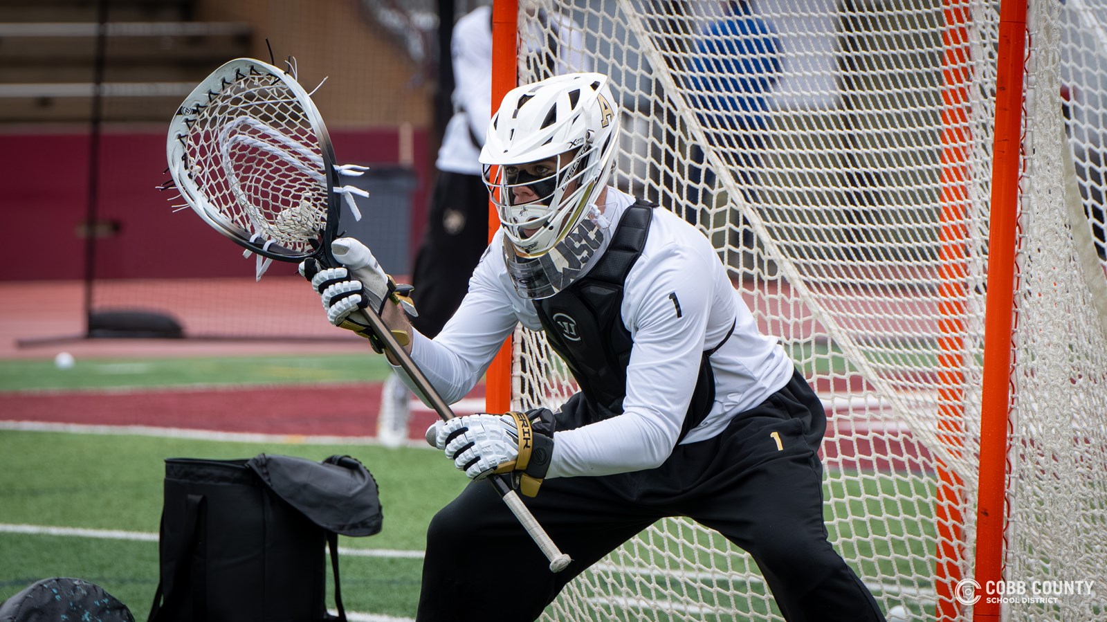 Army's Sean Byrne minds the net during pregame warmups