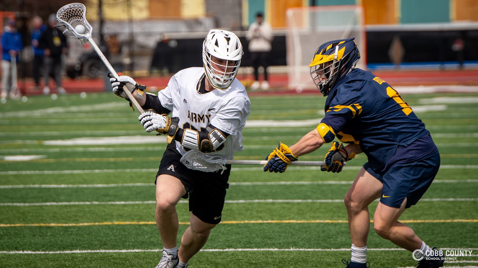 Army's Brayden Fountain maneuvers for a shot against Michigan