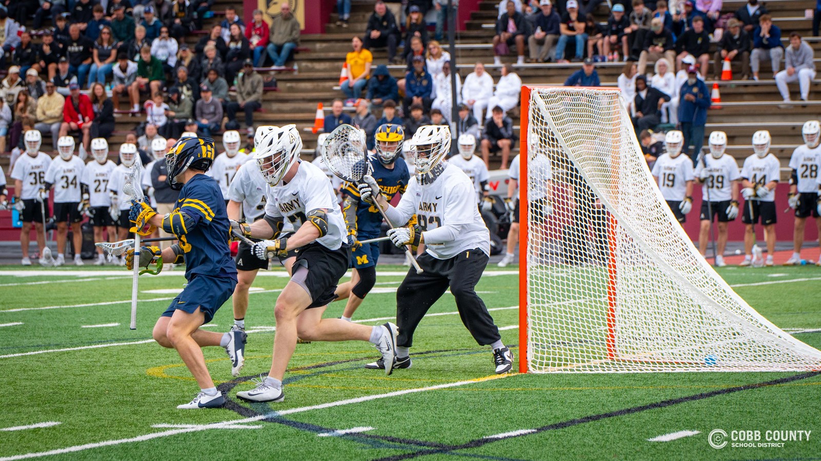 Army's Sean Byrne tends the net against Michigan