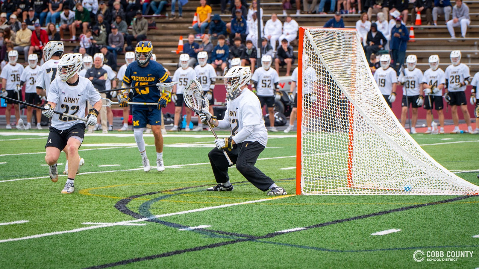Army's Sean Byrne braces for the incoming shot on goal
