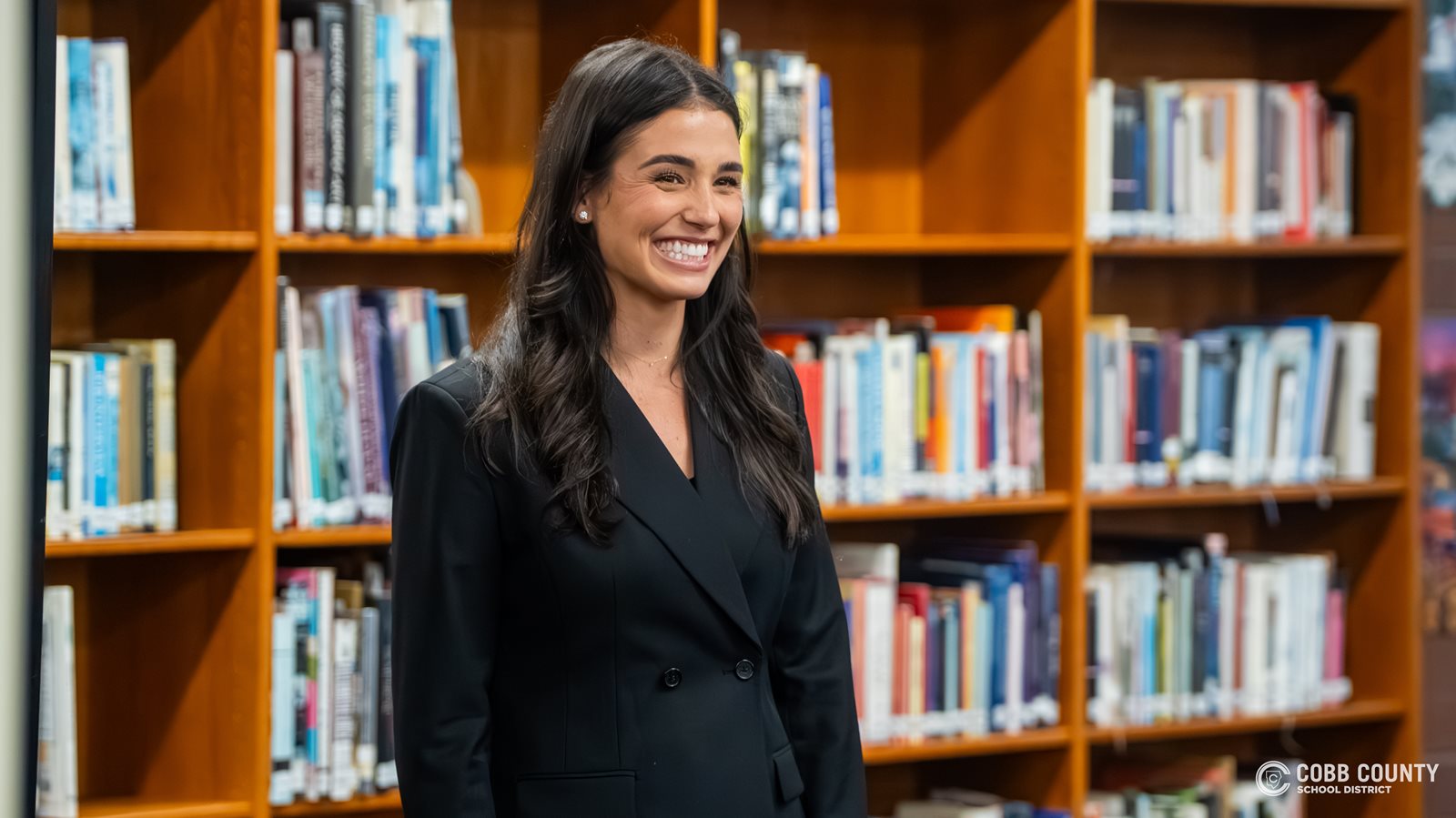 Ashley ShahAhmadi smiles at the student question
