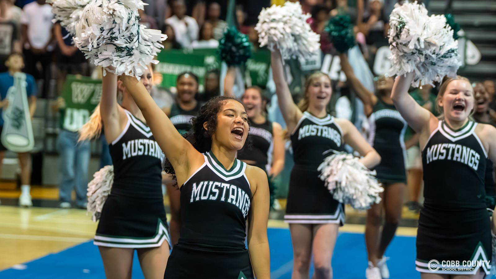 The KMHS cheerleaders get the crowd excited
