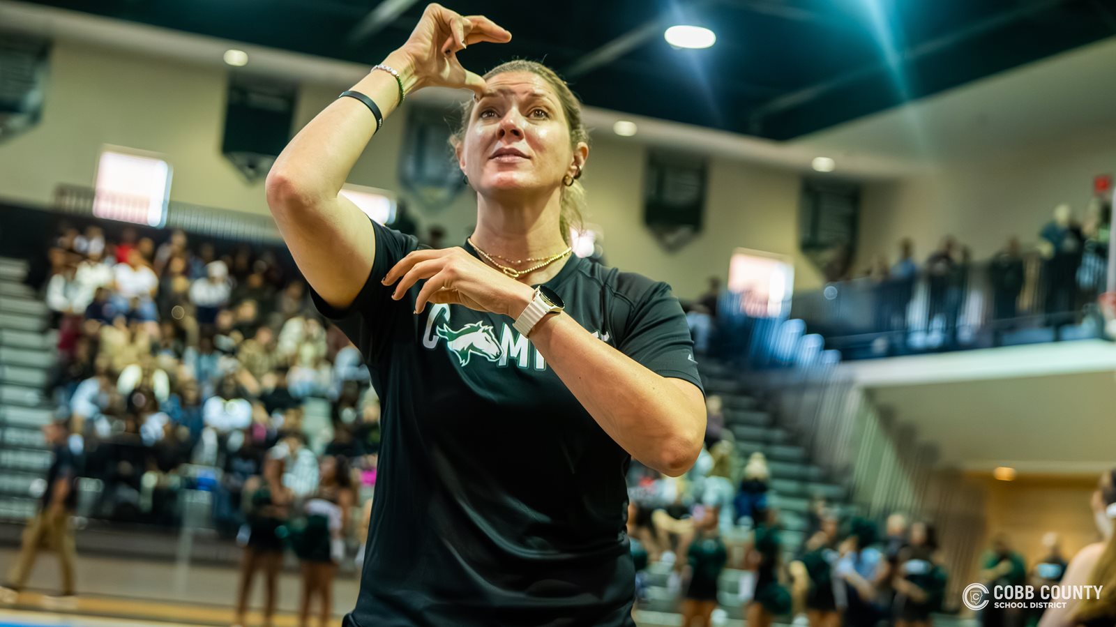 Coach Jarvis works closely with the football team