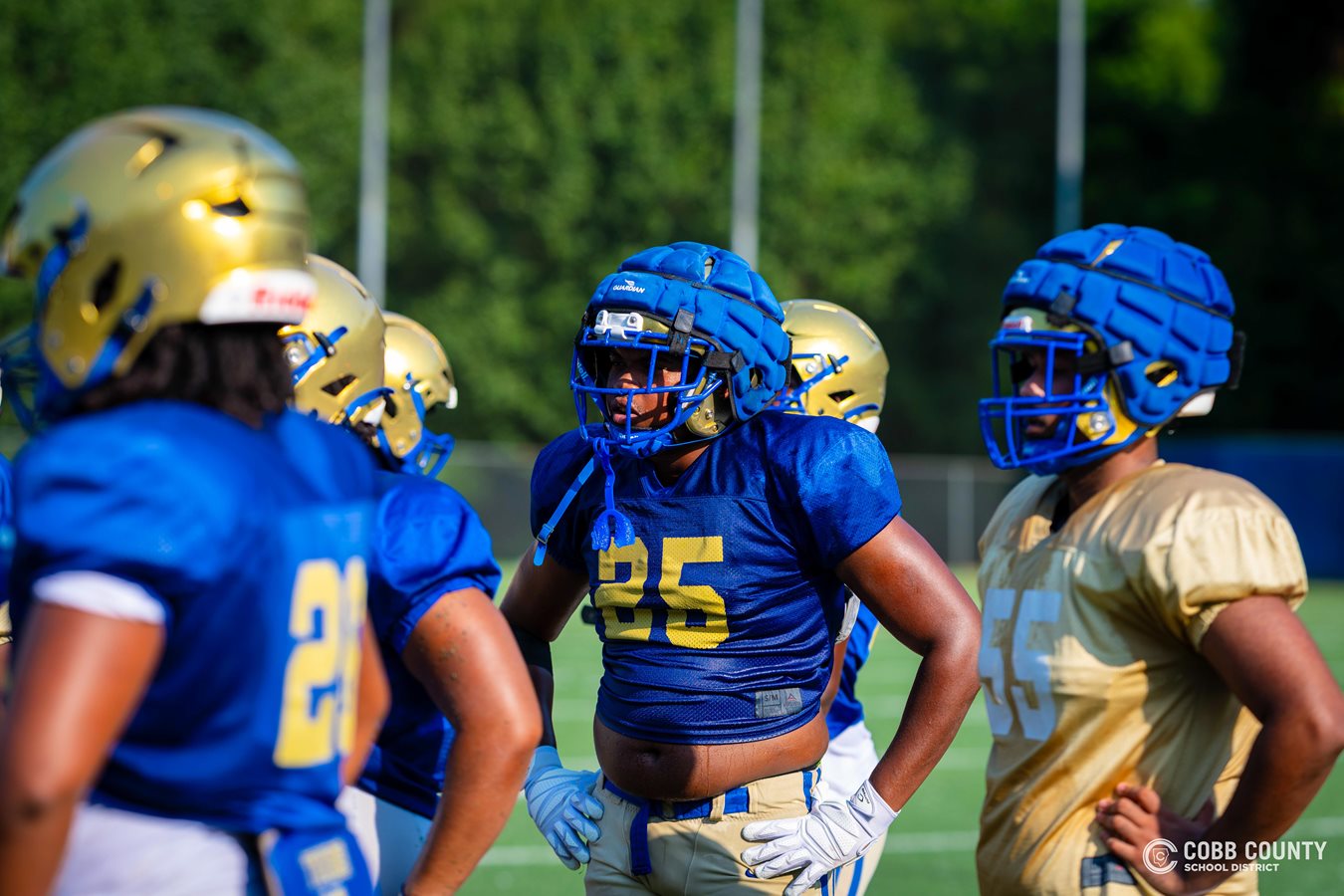 McEachern players take a break from practice drills