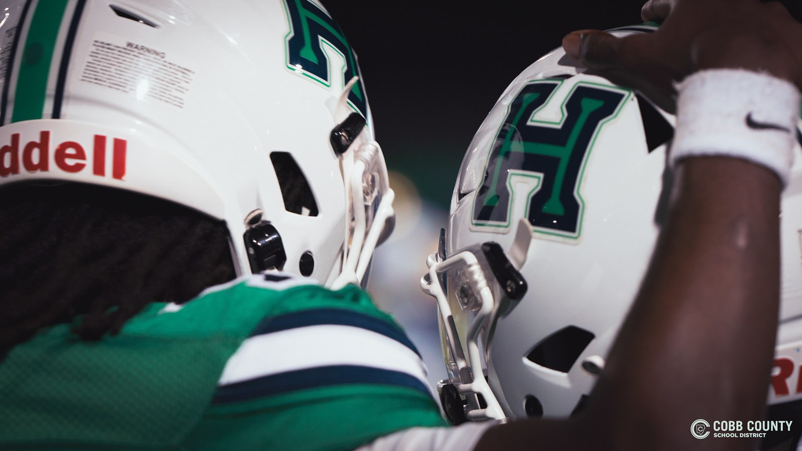 Harrison teammates encouraging one another