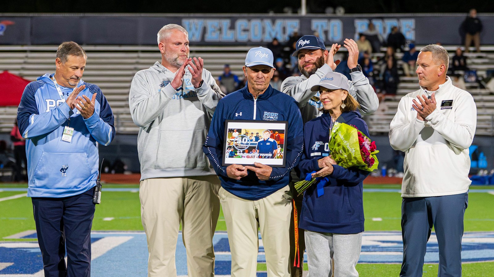 Coach Mahon is honored before his final Pope football game