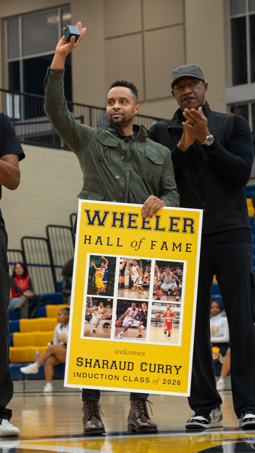 Sharaud Curry accepts his Hall of Fame ring during an in-game recognition