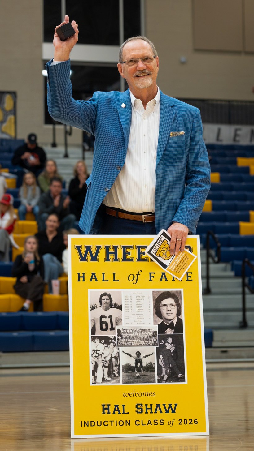 Hal Shaw waves to the crowd after receiving his Hall of Fame ring
