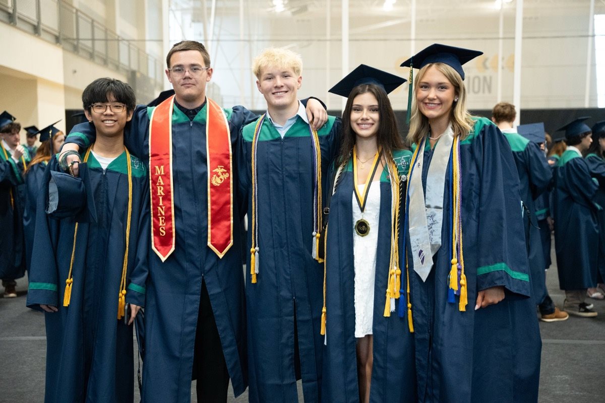 Harrison graduates together at their commencement