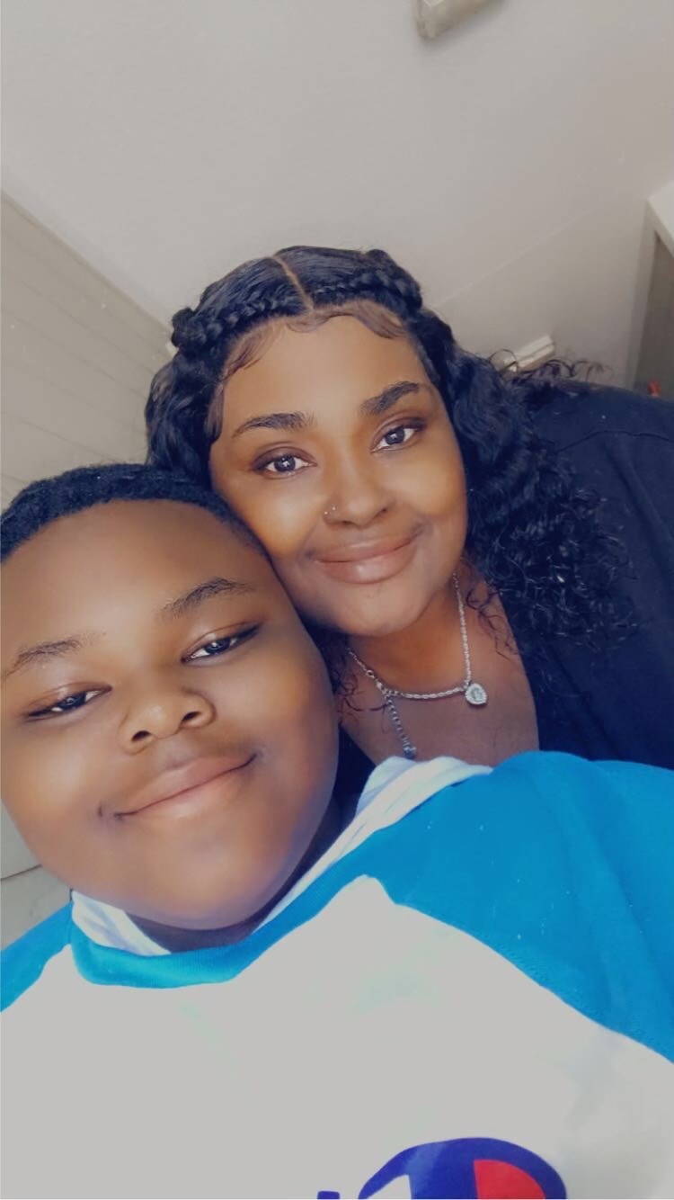 Thomas and his mother, who died from breast cancer during this school year.