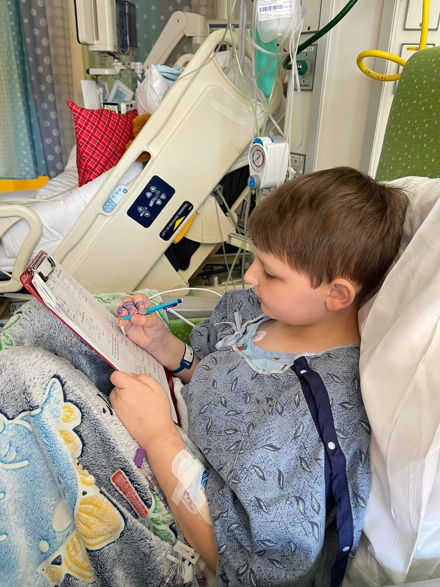 Beau completed schoolwork from the hospital.