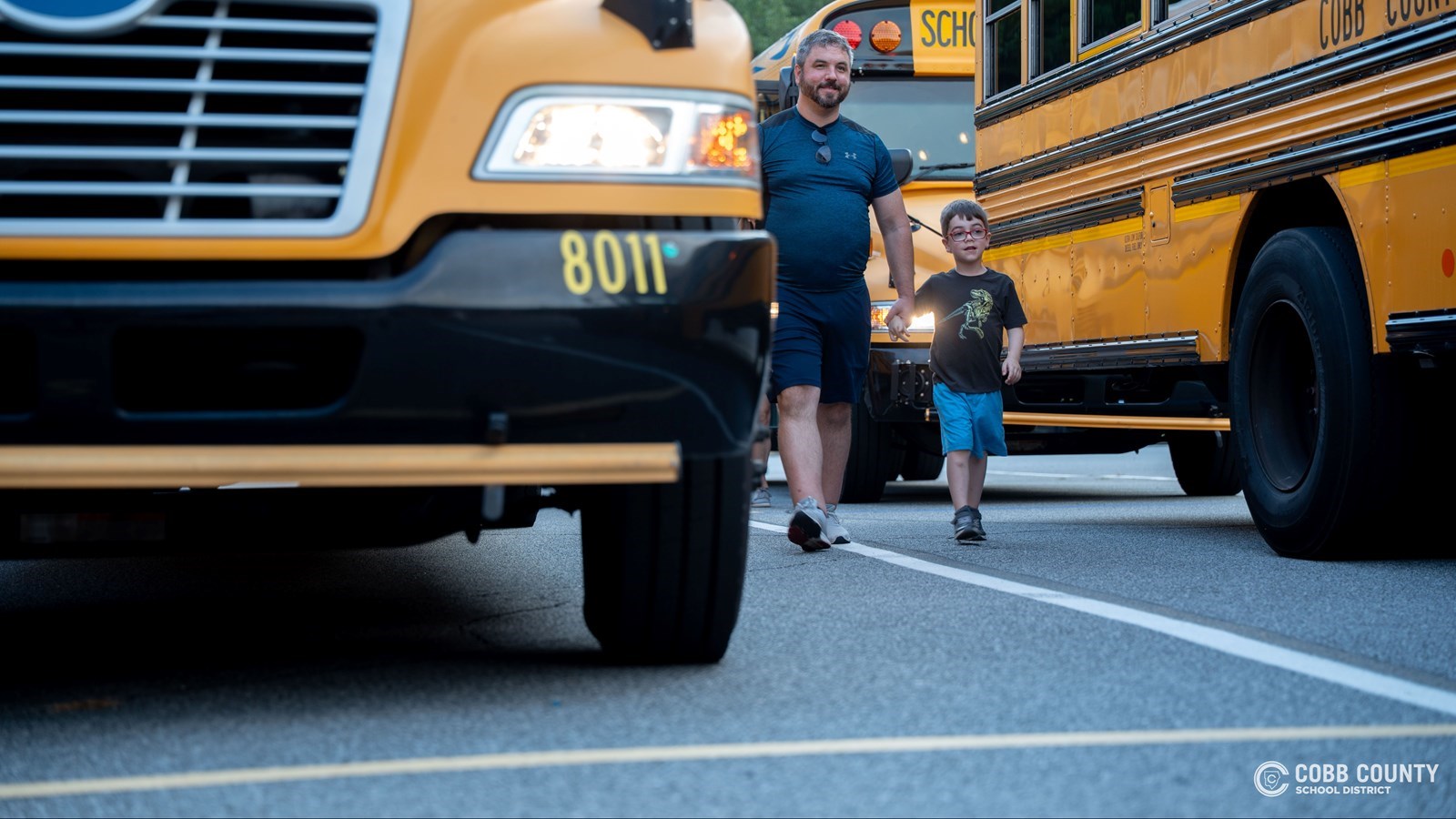 A young student participates in the annual Kindergarten Ride Along ahead of the first day of school.
