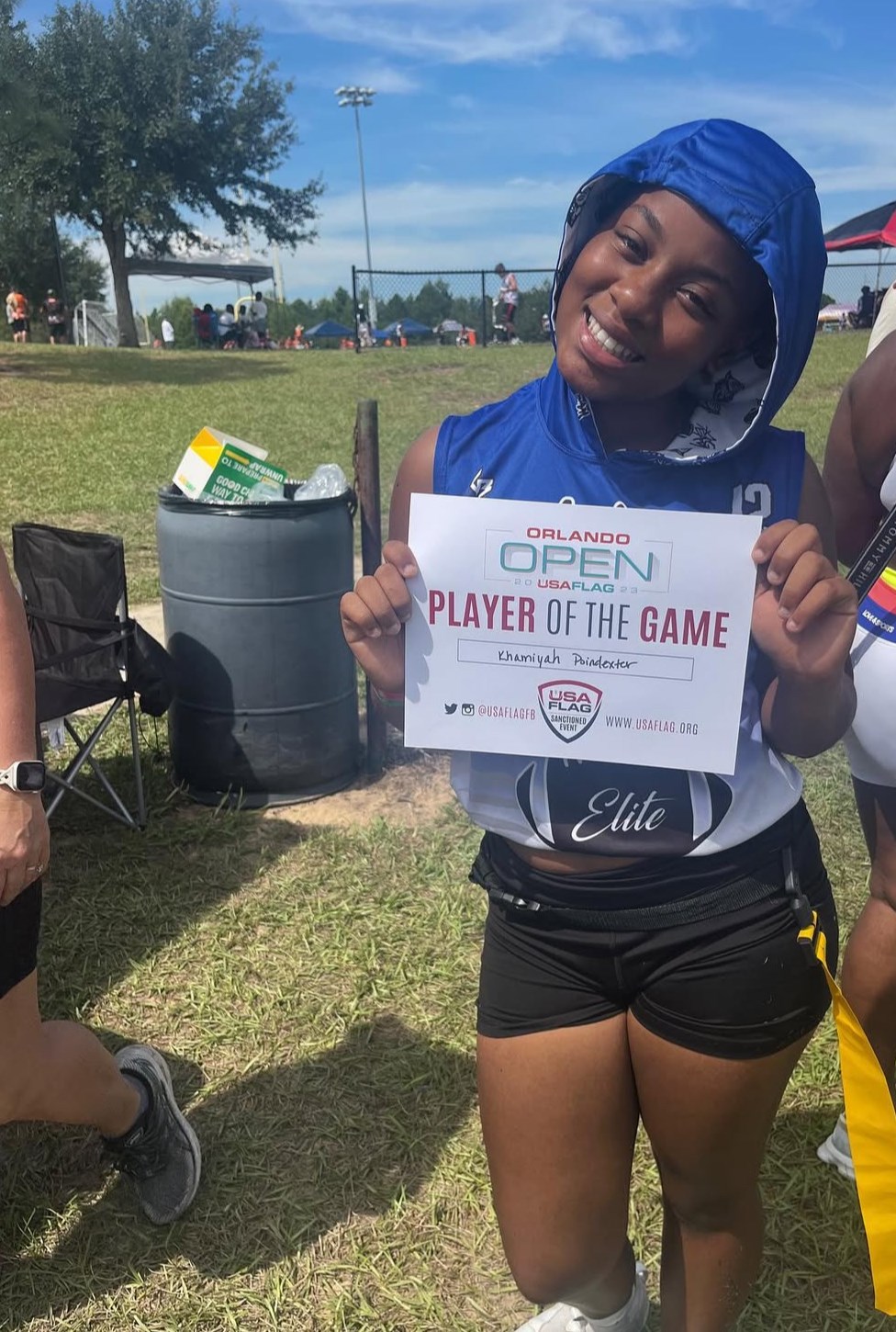 Khamiyah posing with her Orlando award