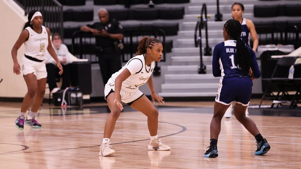 Lenai Louie playing defense during her high school career