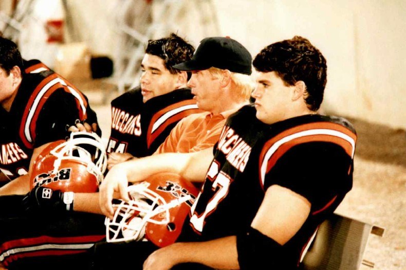 Coach Mahon coaching players in Alabama