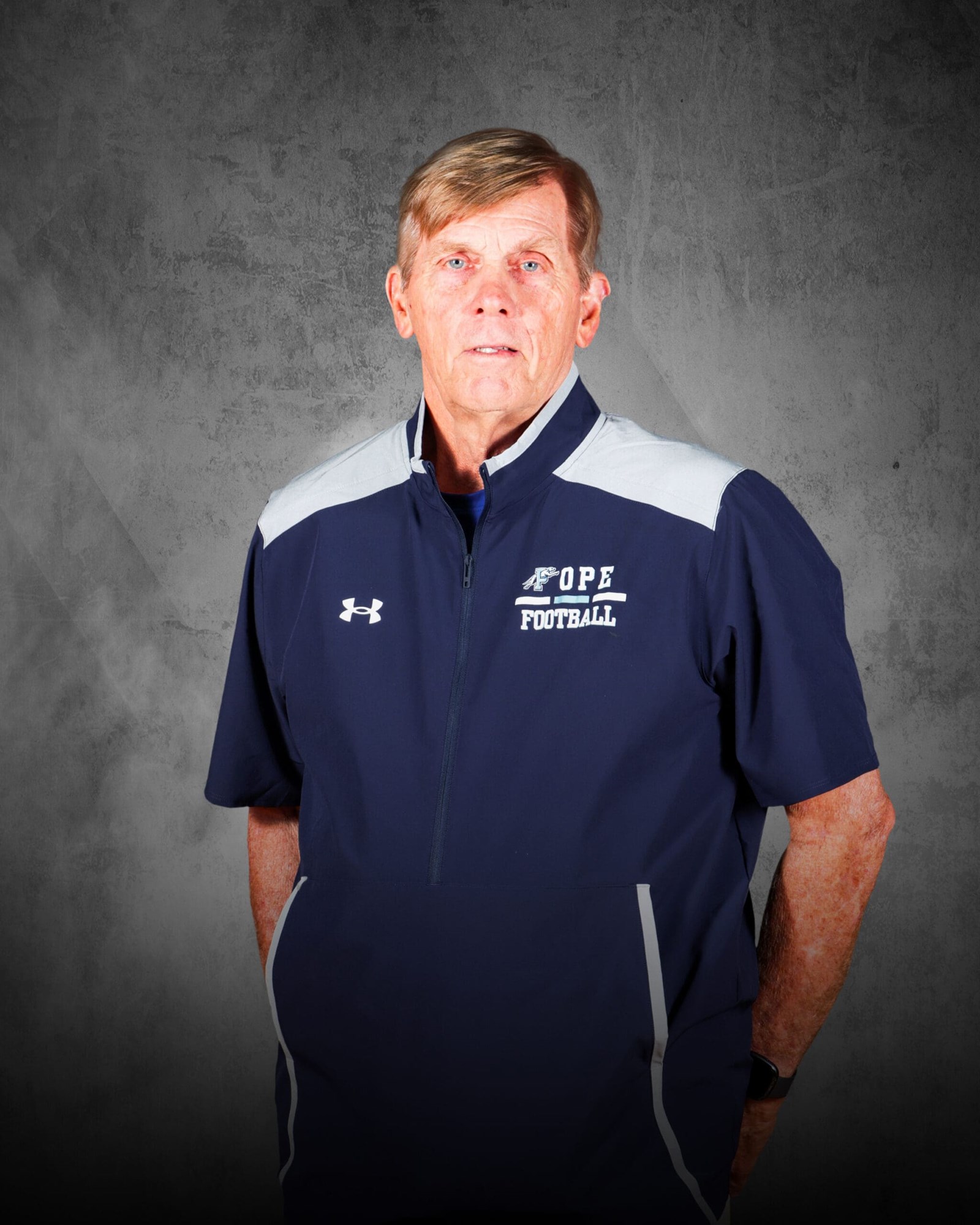 Coach Mahon poses in his Pope coaching gear