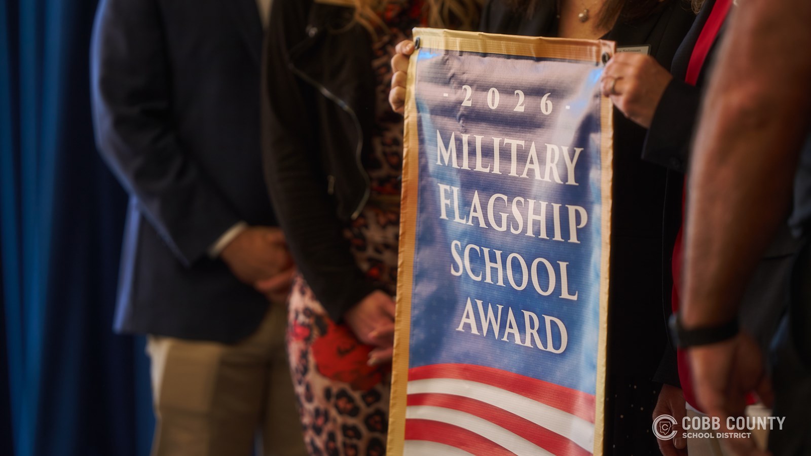 Hightower Trail Middle School community celebrates Military Flagship School recognition ceremony.